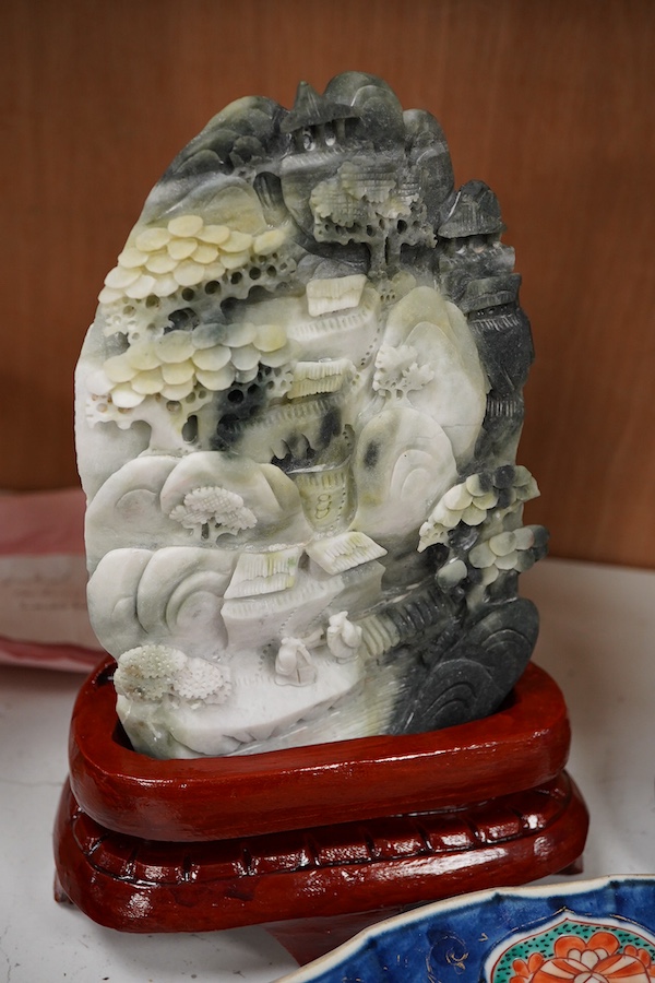 A Japanese Imari dish an Arita bottle vase together with a Chinese cloisonné enamel vase and a Chinese hardstone boulder carving, largest 34cm in diameter
